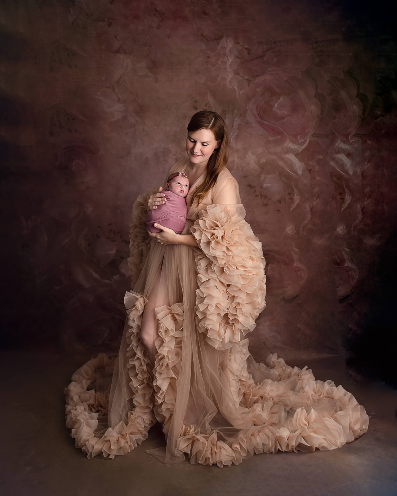 Akron OH newborn photographer captures loving and elegant moment between mom and newborn