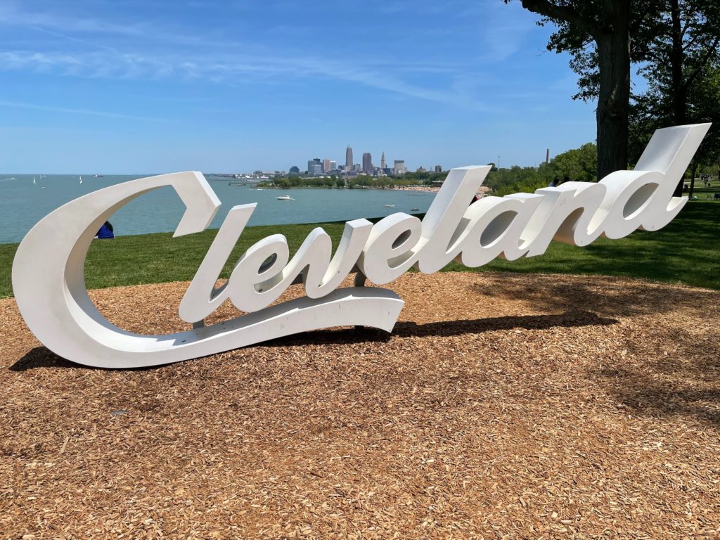 White Cleeland sign alongside lake in Cleveland OH