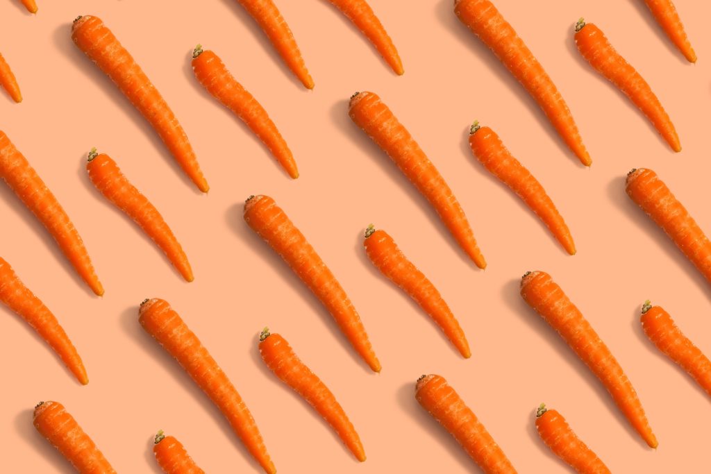 photo of carrots representing the size of the baby in your belly