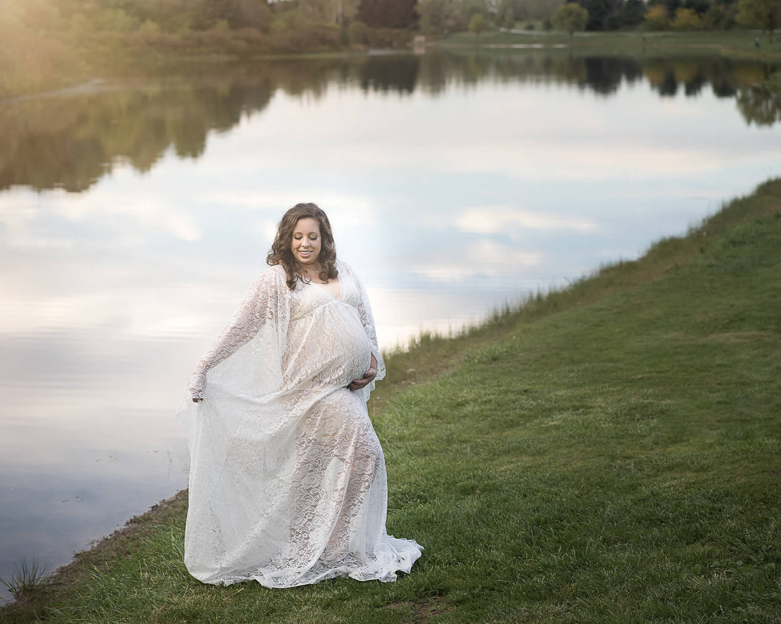 prenatal massage in akron oh in blog photo of pregnant woman in white dress