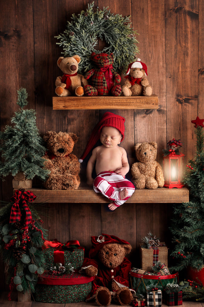 feeding specialists in Akron in blog photo of sleeping newborn with a christmas theme