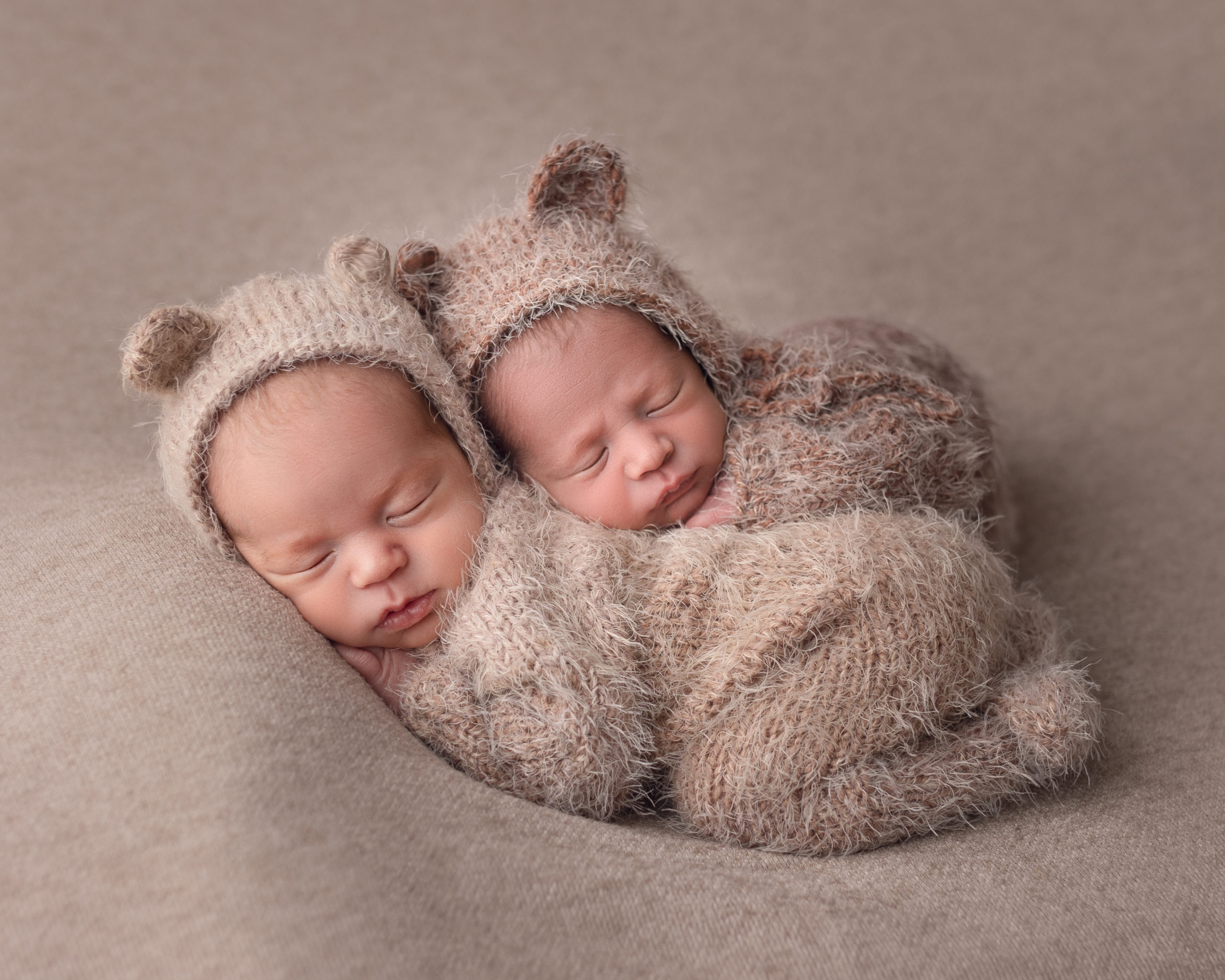 infant and newborn massage in blog photo of twin newborn session