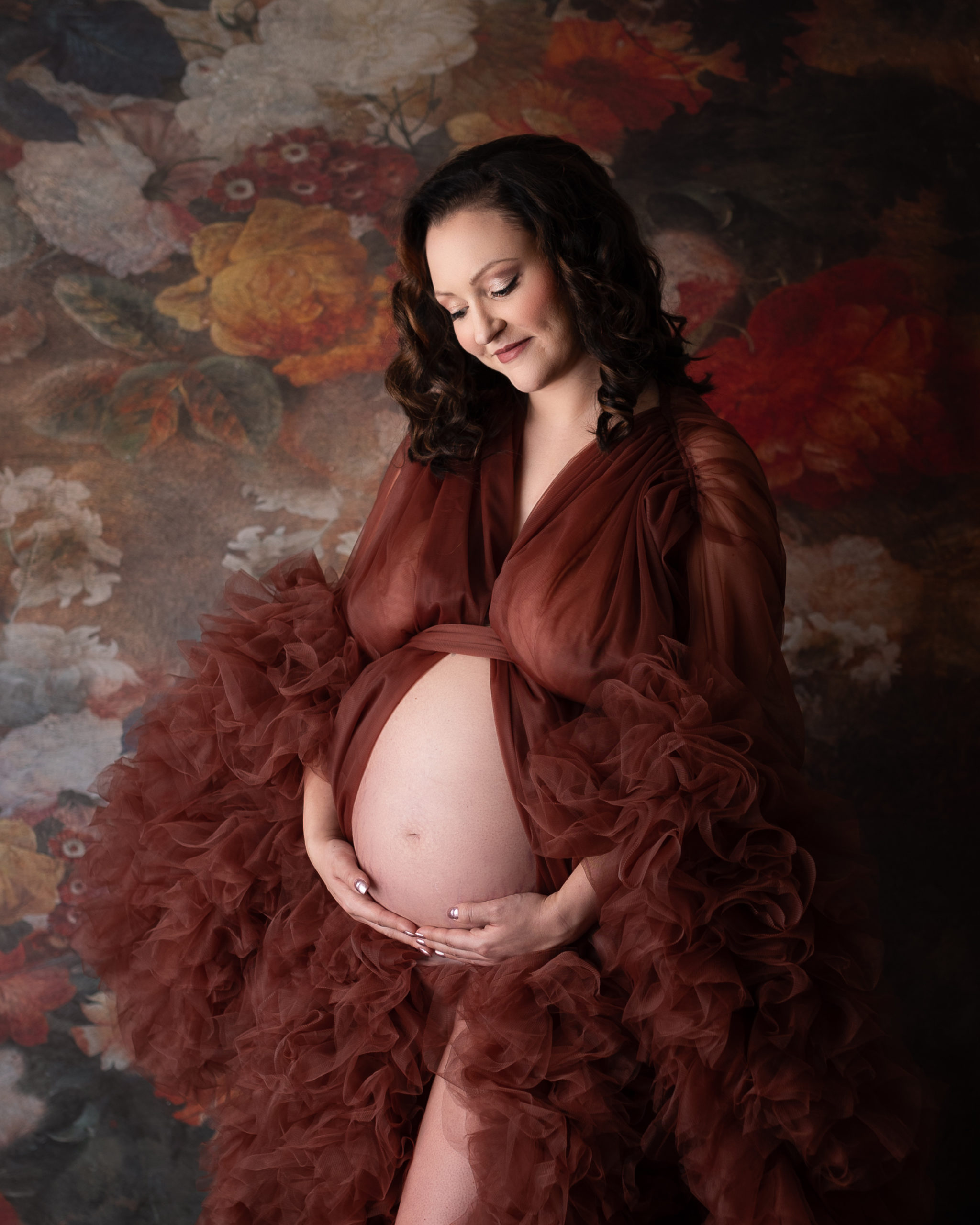 prenatal yoga studios in Akron in blog photo of pregnant woman during luxury maternity session